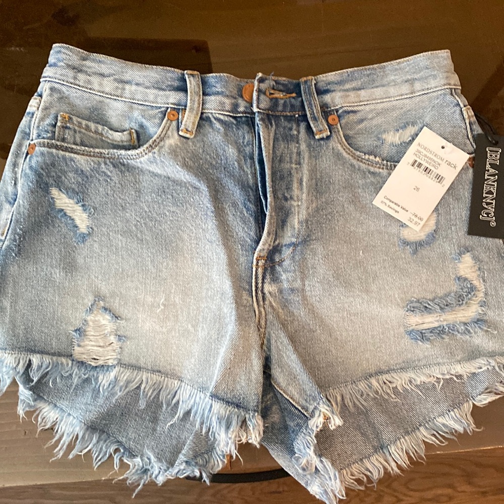 Brand new. Never worn. High waisted jean shorts